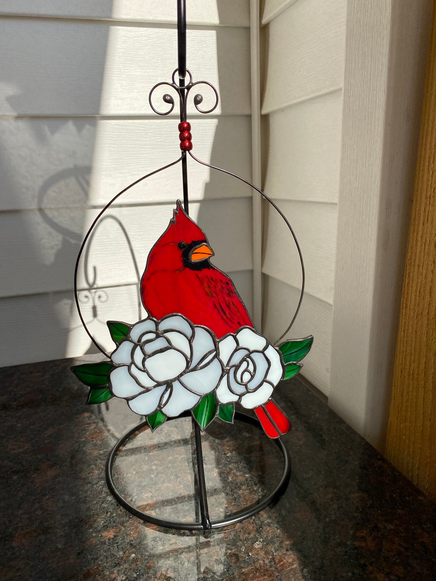 Cardinal with Roses