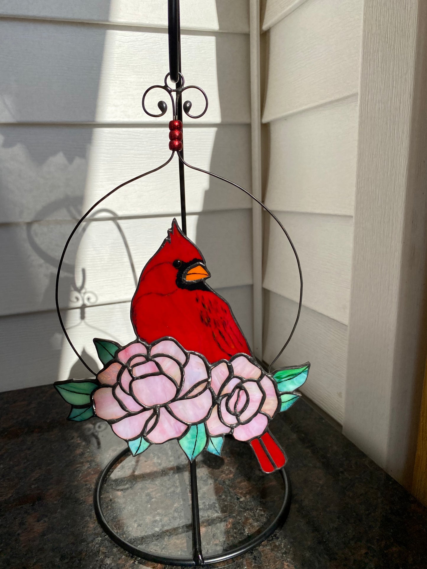 Cardinal with Roses